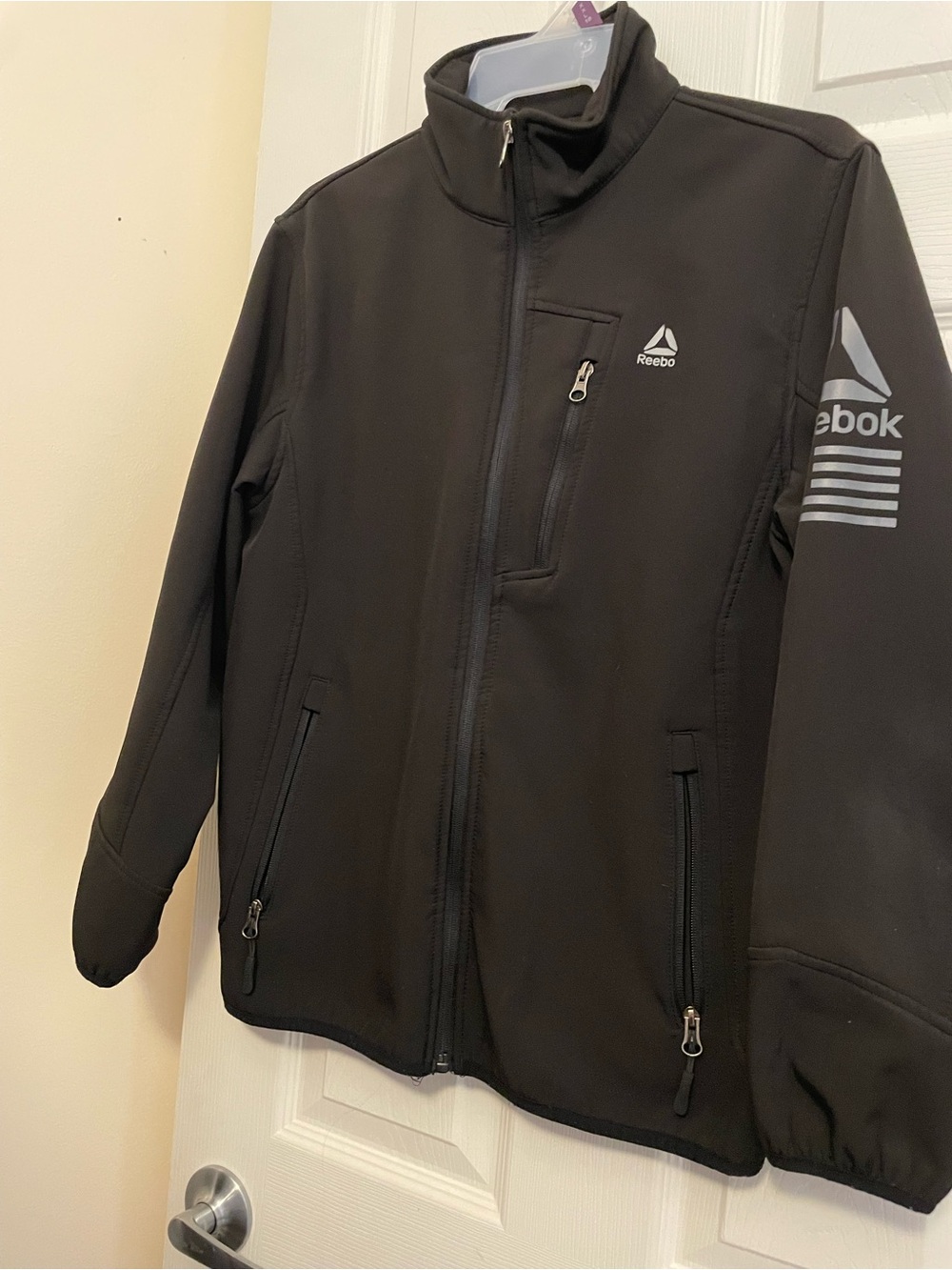Reebok Black Softshell Kids Jacket with Reflective Logos